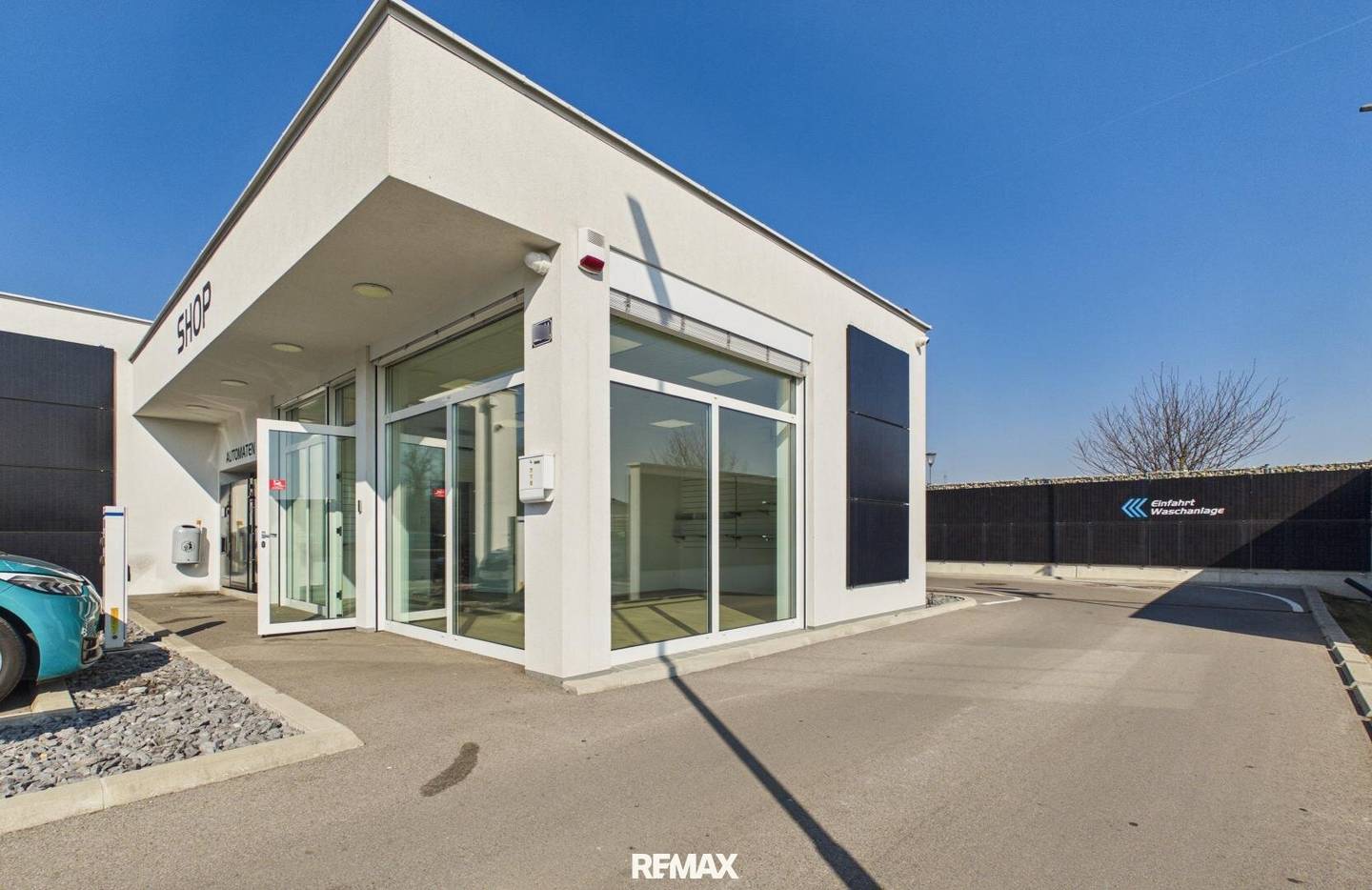 Modern commercial space with hall and shop at the car wash park
