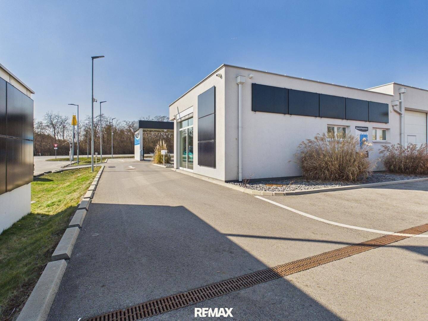 Modern commercial space with hall and shop at the car wash park