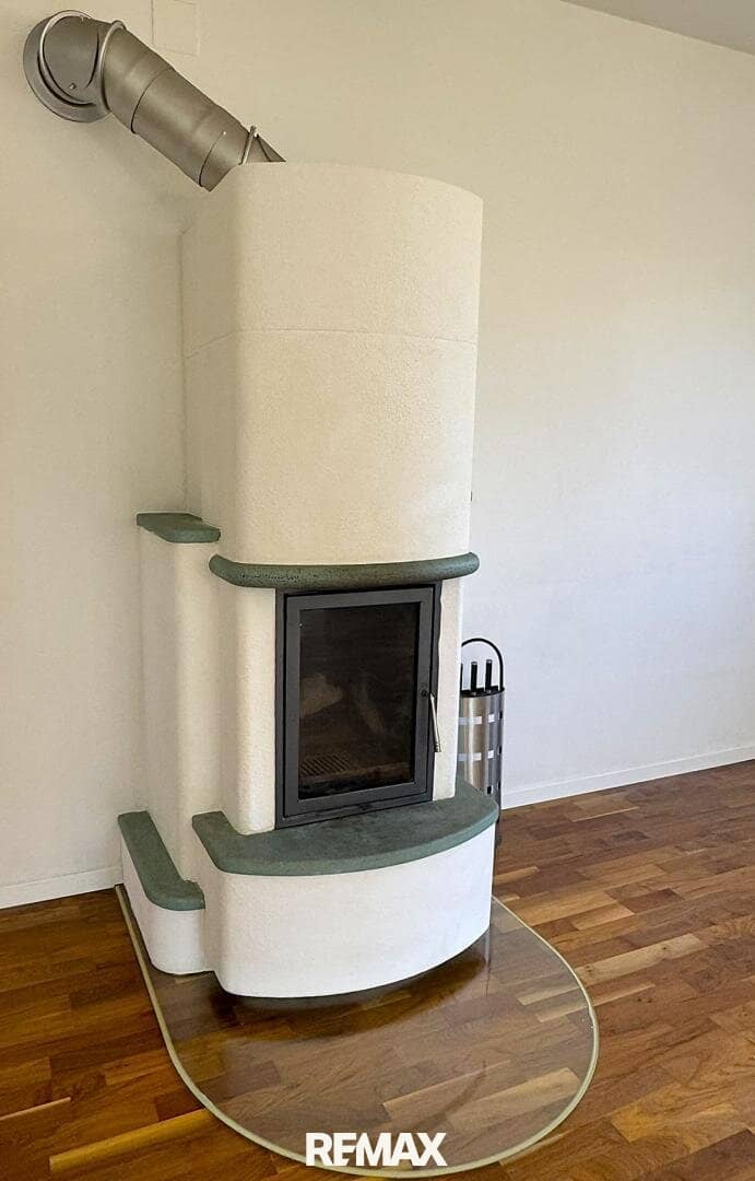Wohnung im Erdgeschoss mit Kamin und Garten