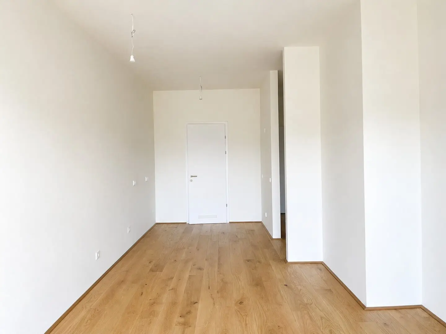 Wohnung mit Garten und Terrasse im Neubau The Hills