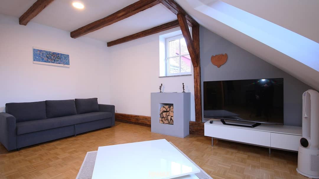 Apartment in renovated building on the main square