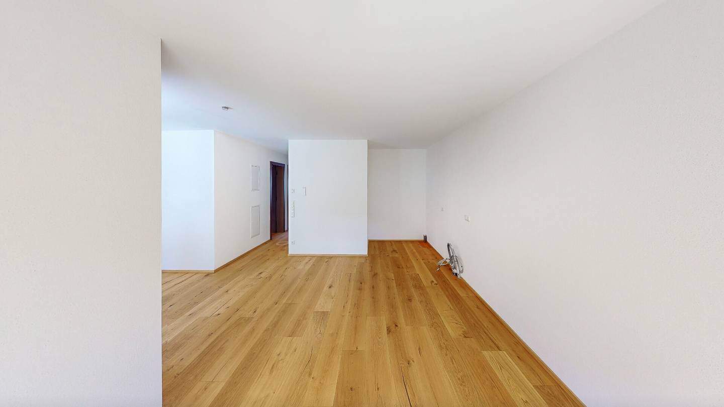 Erdgeschosswohnung mit Garten und Alpenblick