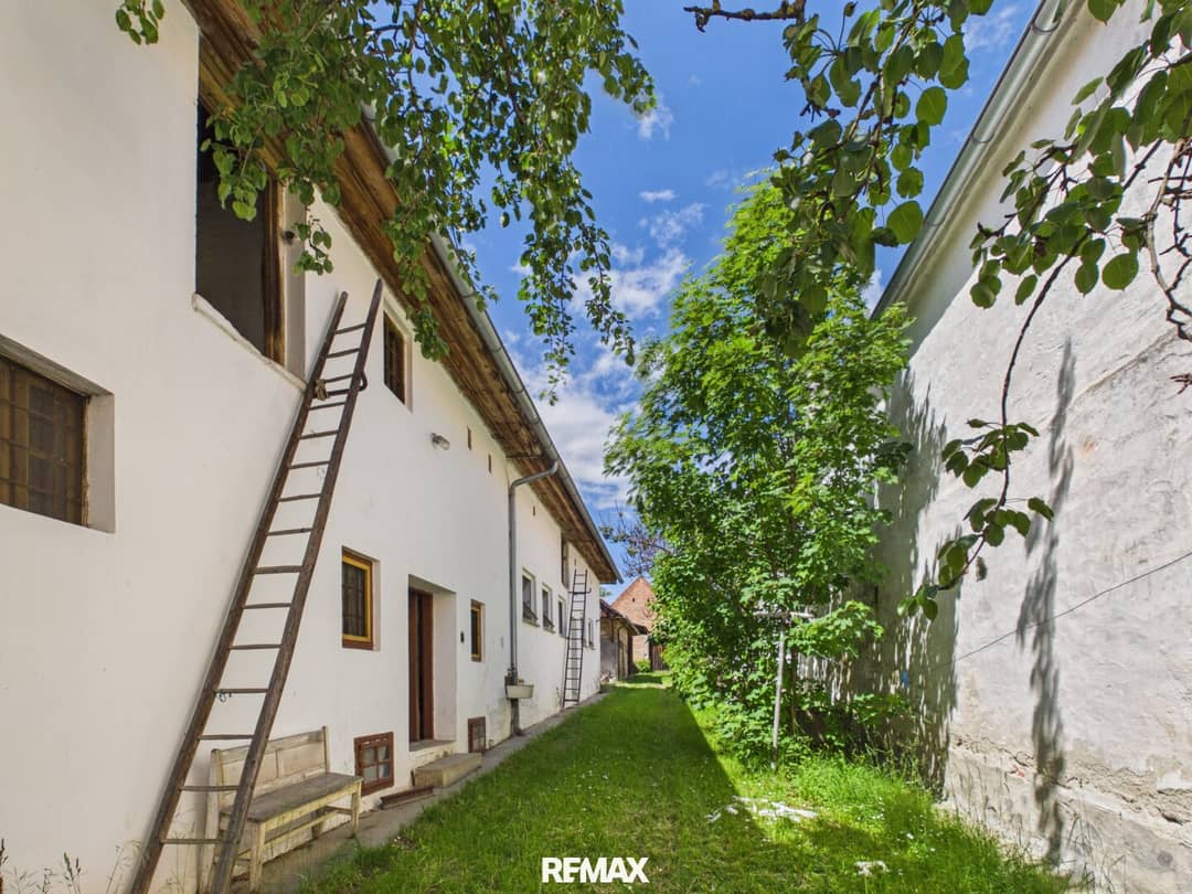 Farmhouse with Outbuildings and Building Land