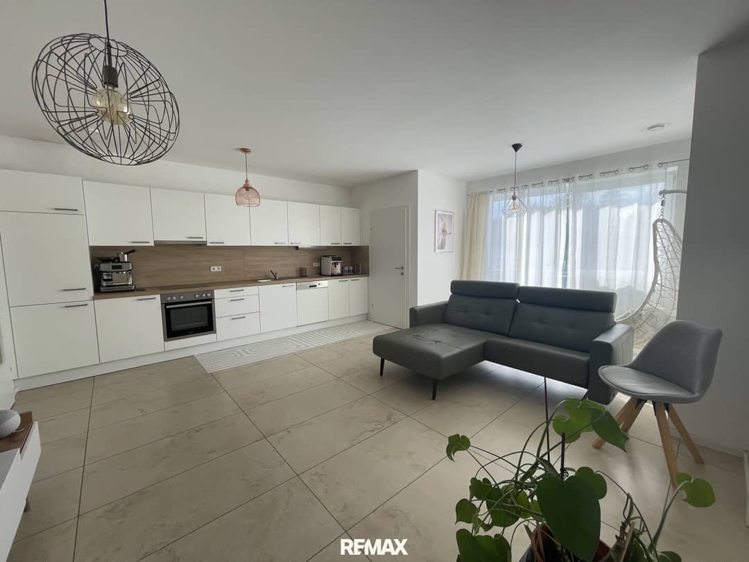 Modern apartment with balcony and carport