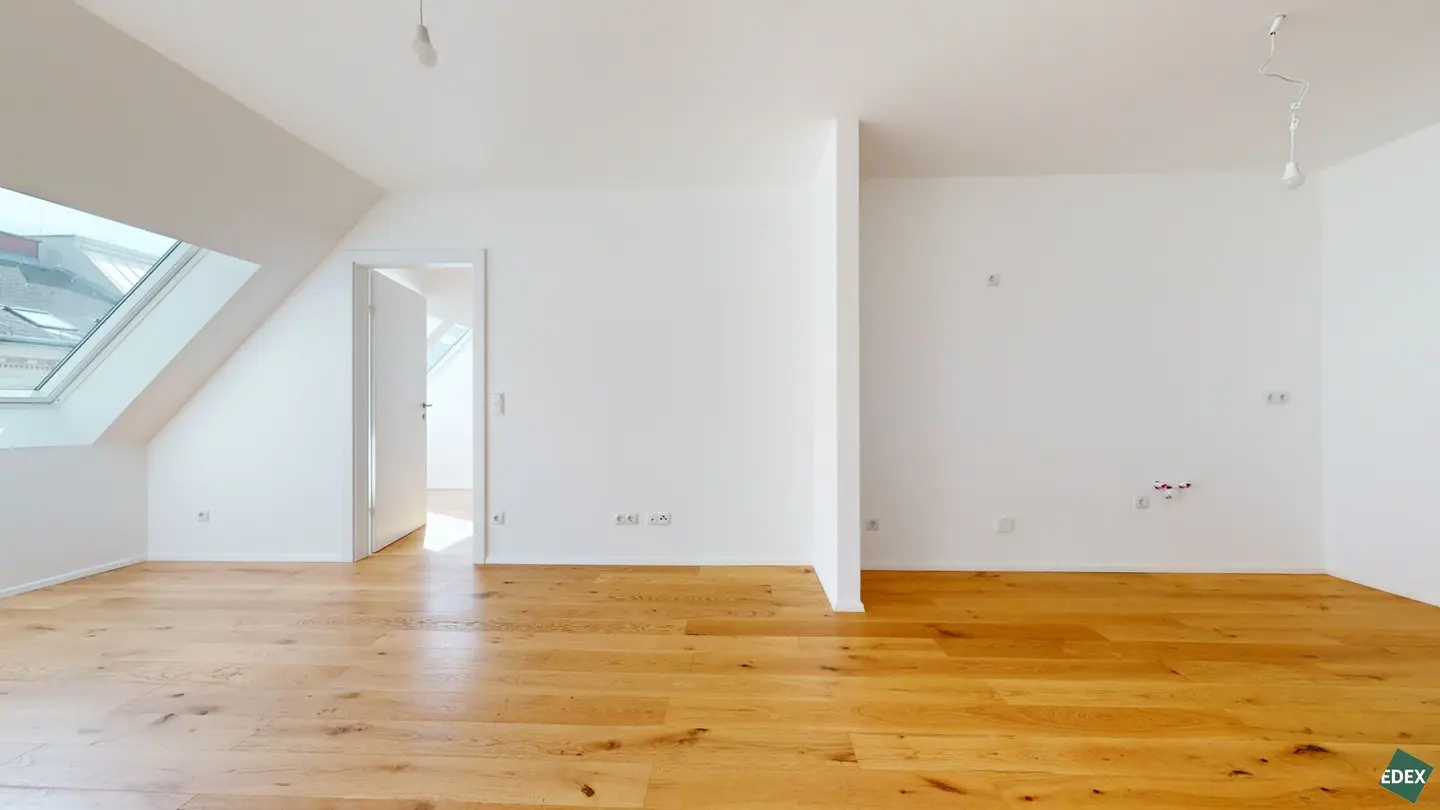 Dachgeschosswohnung mit großer Terrasse in ruhiger Lage