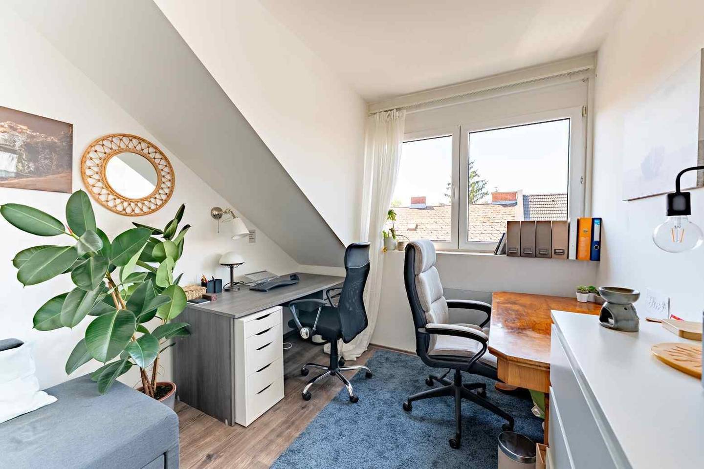 Attic apartment with spacious balcony and renovated bathroom