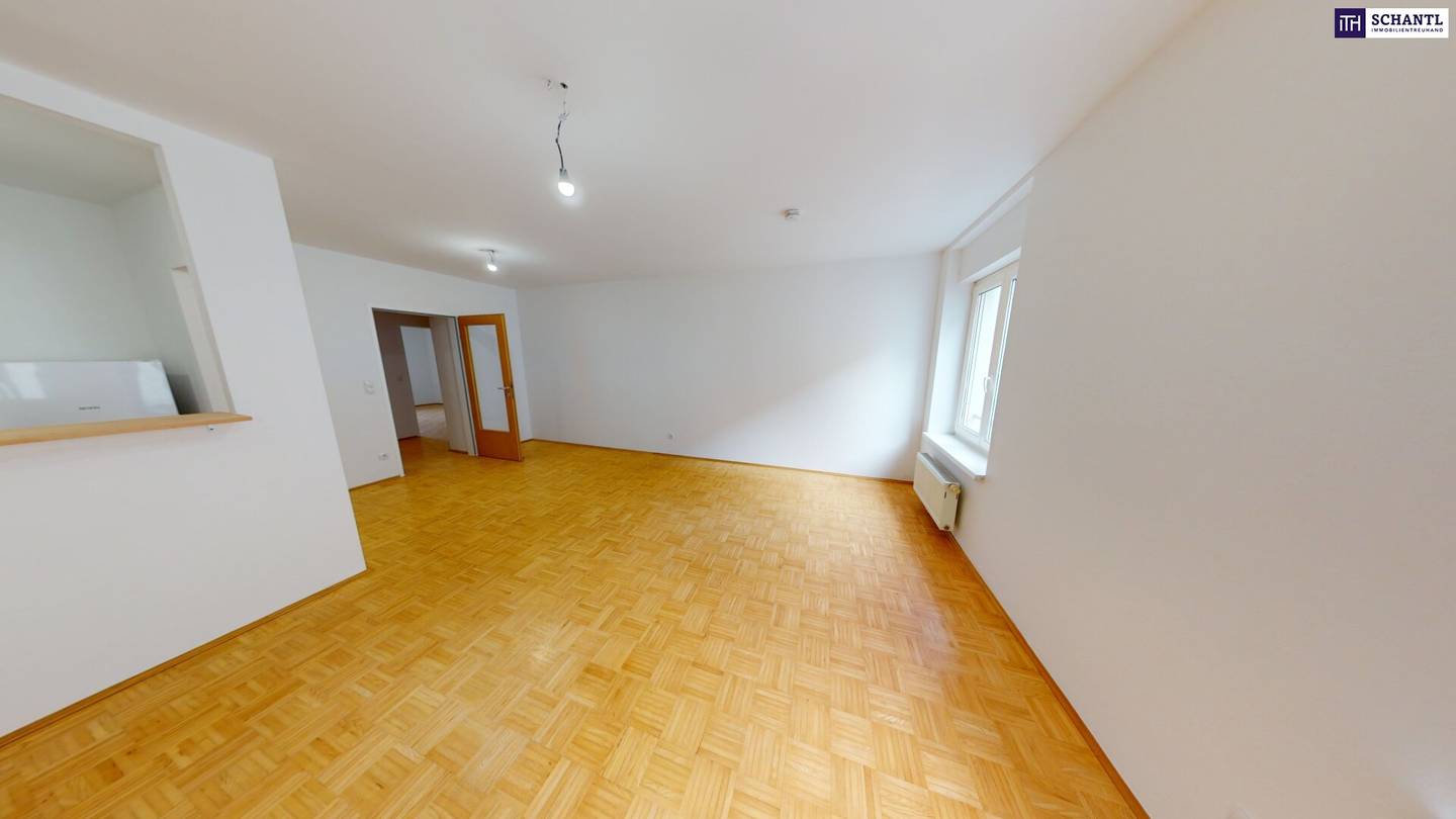 Dachgeschosswohnung mit eigenem Garten Erstbezug