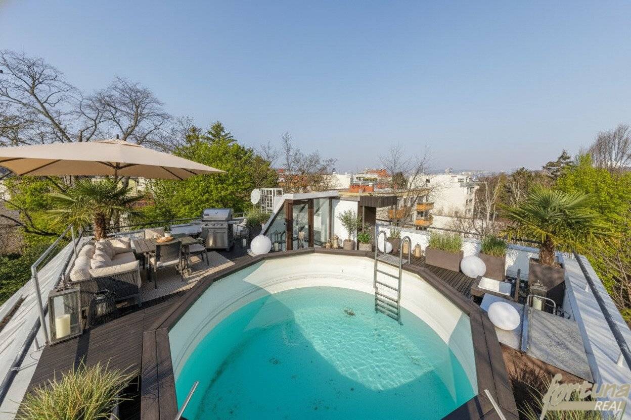 Dachgeschosswohnung mit Dachterrasse und Pool