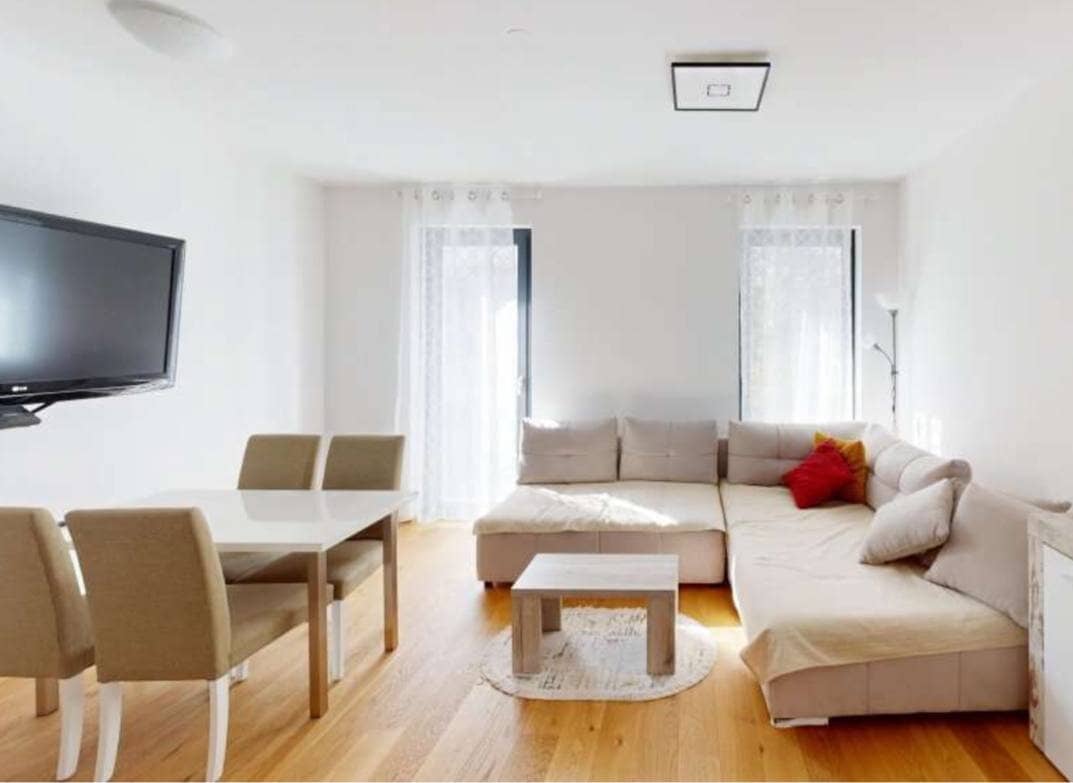 Neubauwohnung mit Balkon und Eigengarten