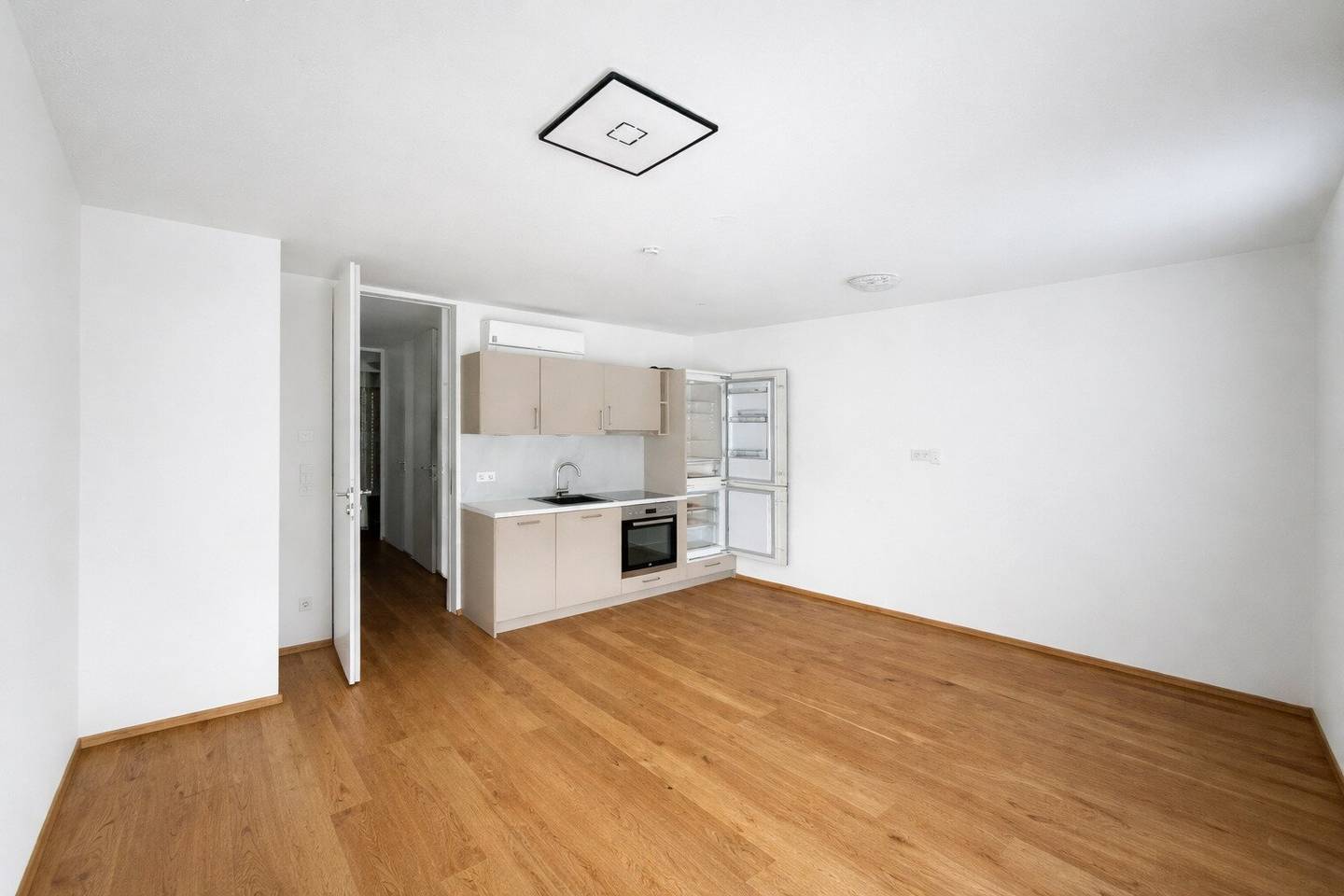 Neubauwohnung mit Balkon und Eigengarten