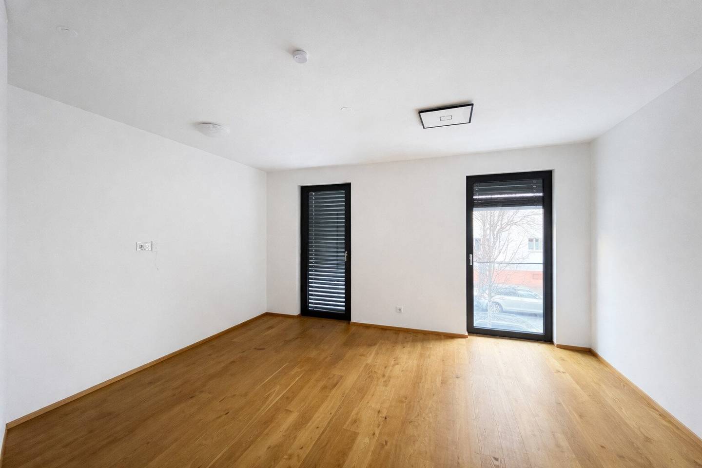 Neubauwohnung mit Balkon und Eigengarten