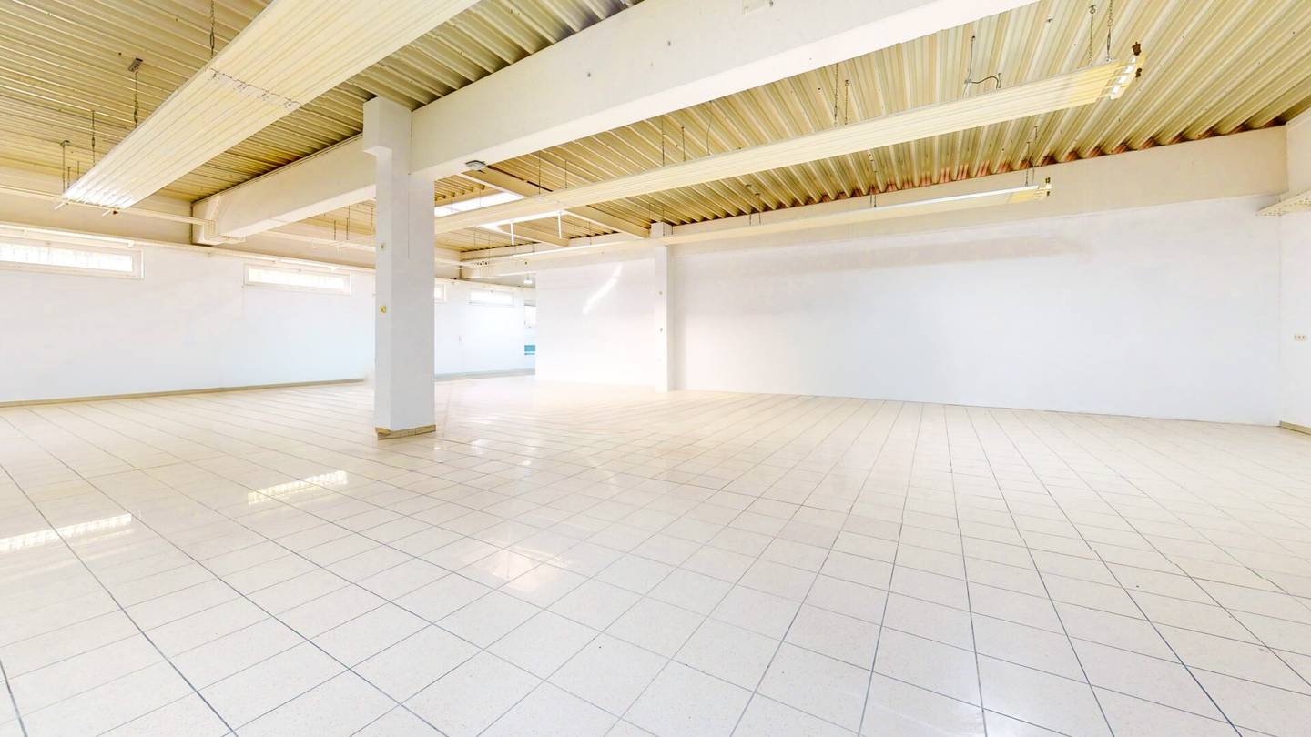 Versatile commercial space with storage and loading area in central location