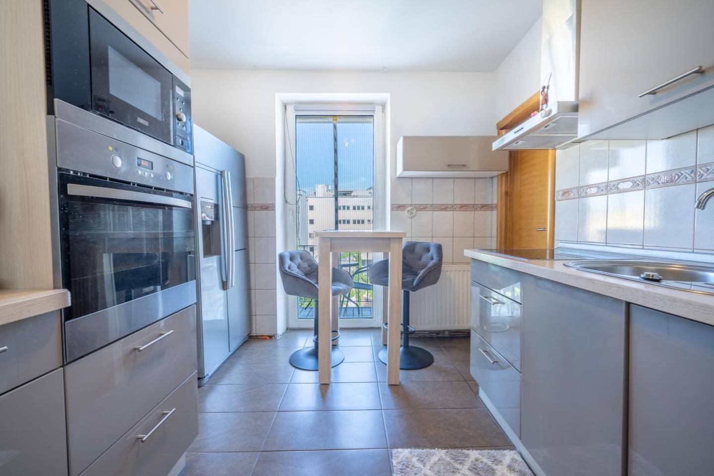 Apartment in city center near the Salzach with two balconies