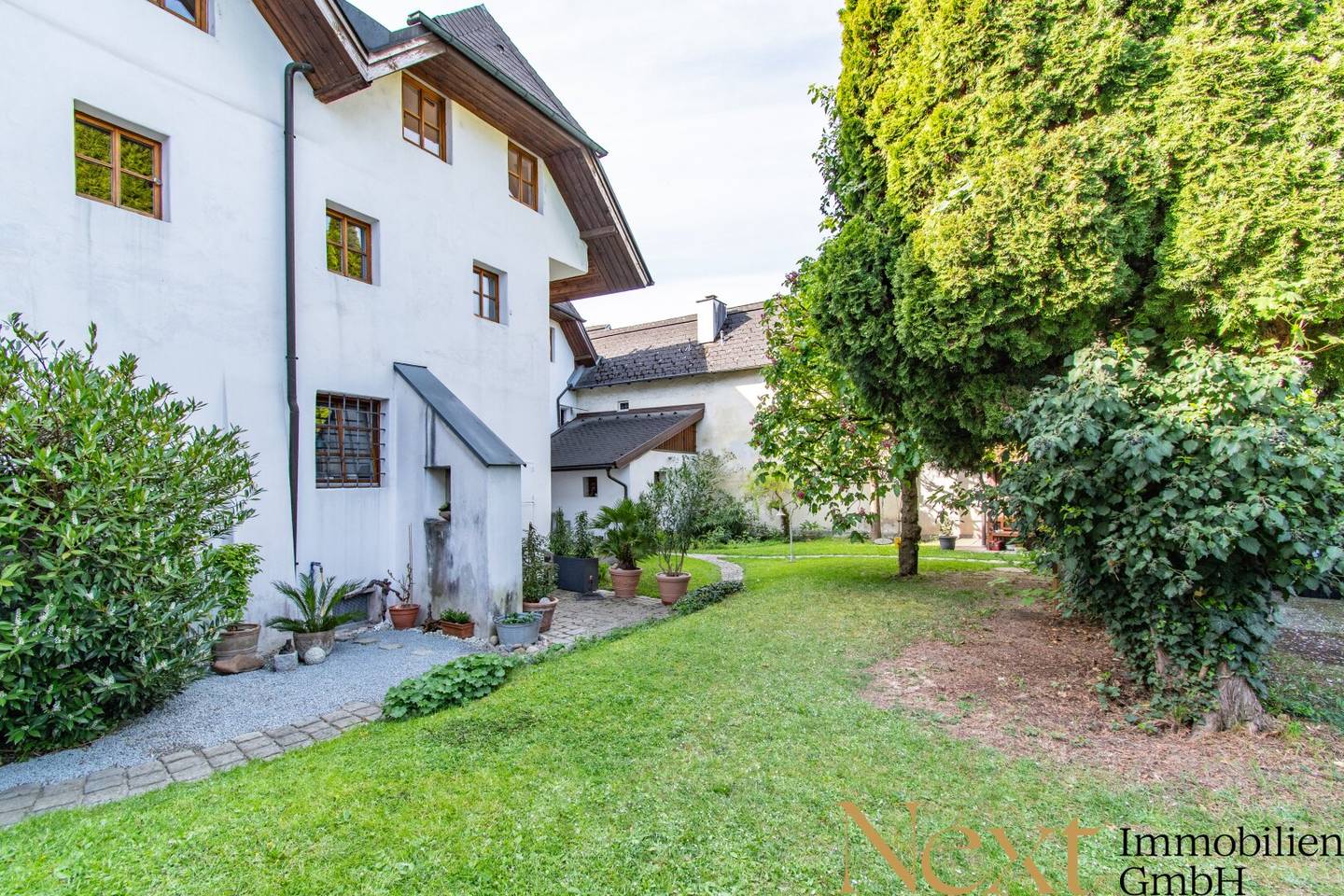 Charming Historic House with Garden in Prime Location