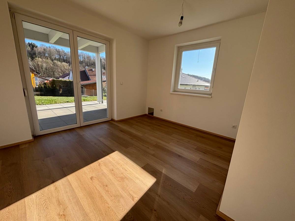 Wohnung mit Eigengarten und Erstbezug