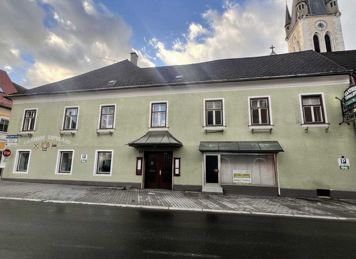 Geschäfts und Wohnhaus mit Terrasse und Garage in zentraler Lage