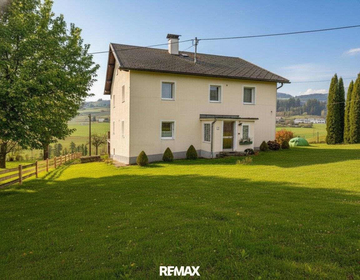 Geräumiges Zweifamilienhaus mit sonnigem Balkon und großem Garten