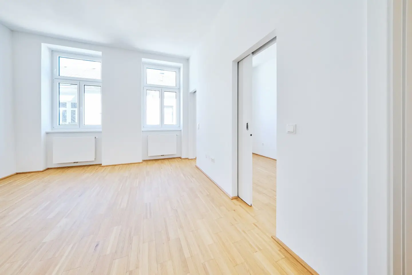Bright period apartment with balcony and elevator in quiet courtyard setting