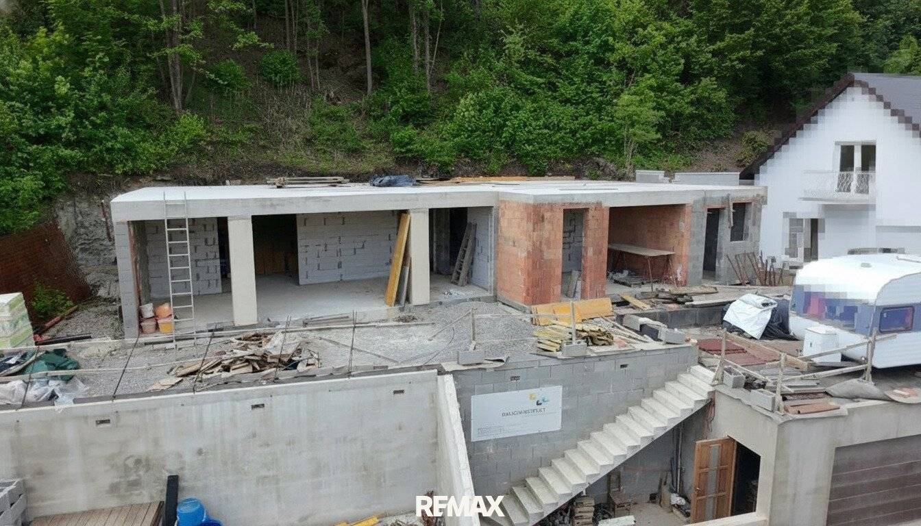 Modern single family house under construction with terrace and garage