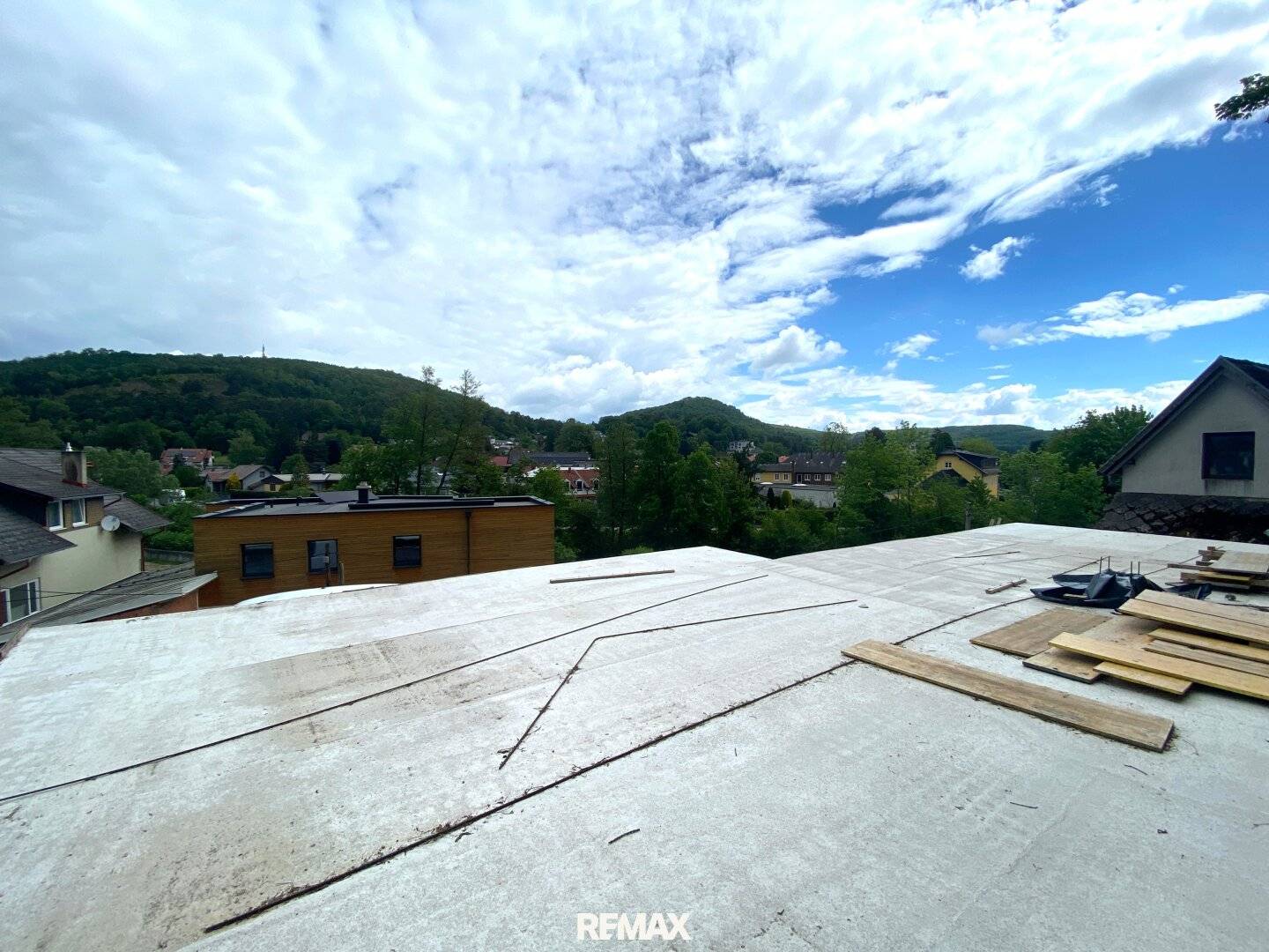 Modern single family house under construction with terrace and garage
