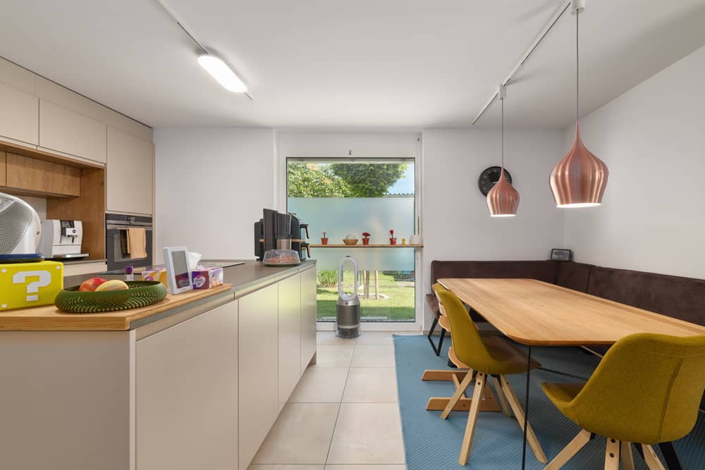 Erdgeschosswohnung mit Garten und Tiefgaragenplatz
