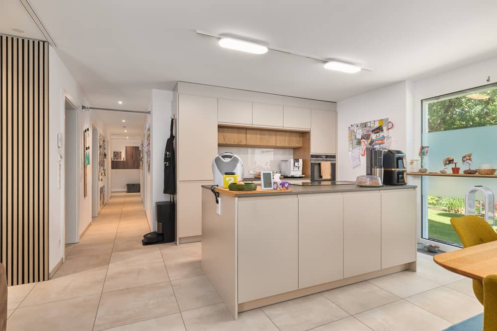Erdgeschosswohnung mit Garten und Tiefgaragenplatz