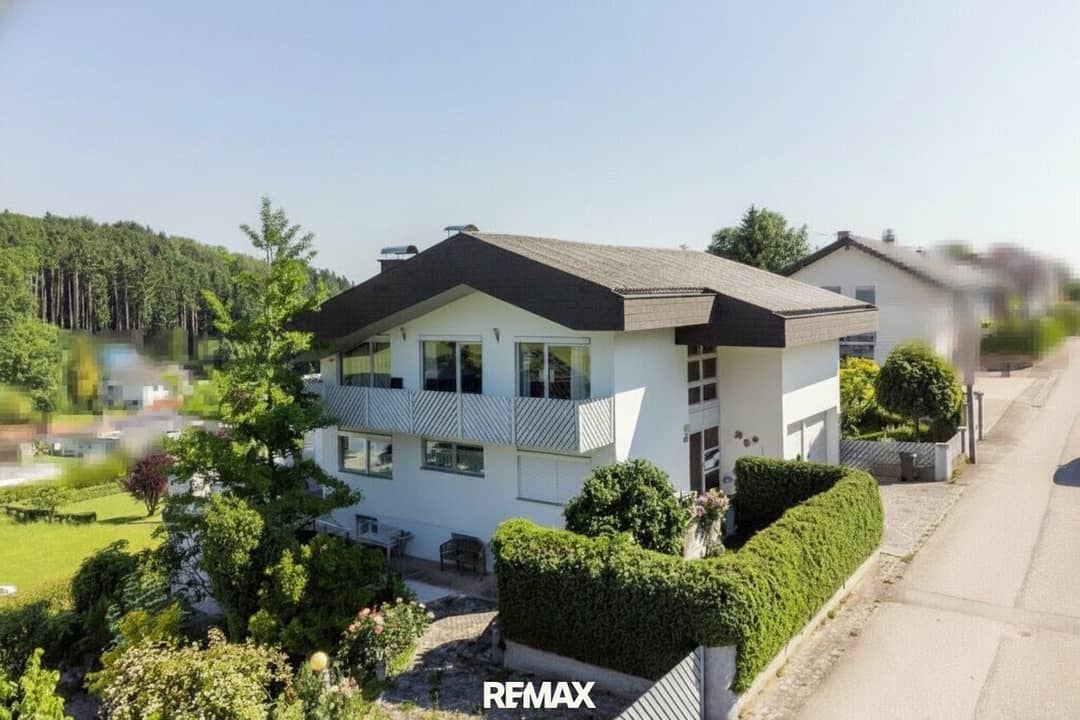 Family-friendly architect-designed house with terraces and garden in a quiet residential area