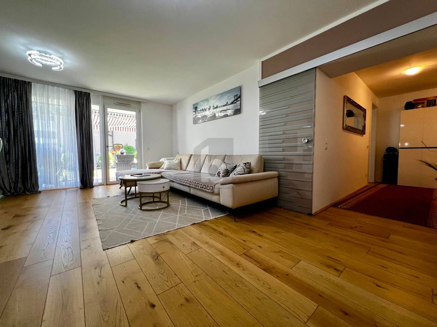 Erdgeschosswohnung mit sonnigem Privatgarten und Tiefgaragenplatz