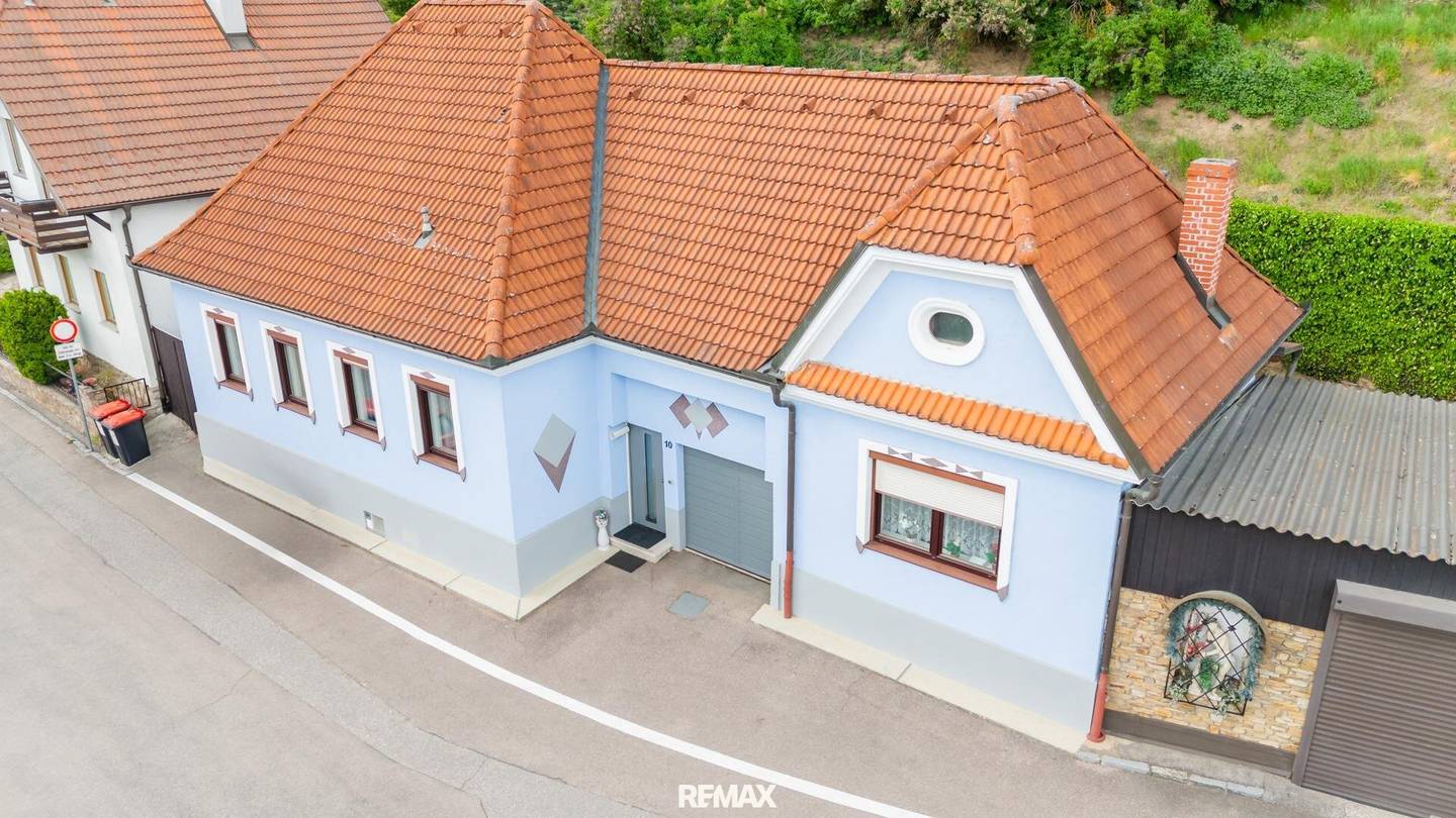 Charmantes Einfamilienhaus mit Innenhof und Wintergarten