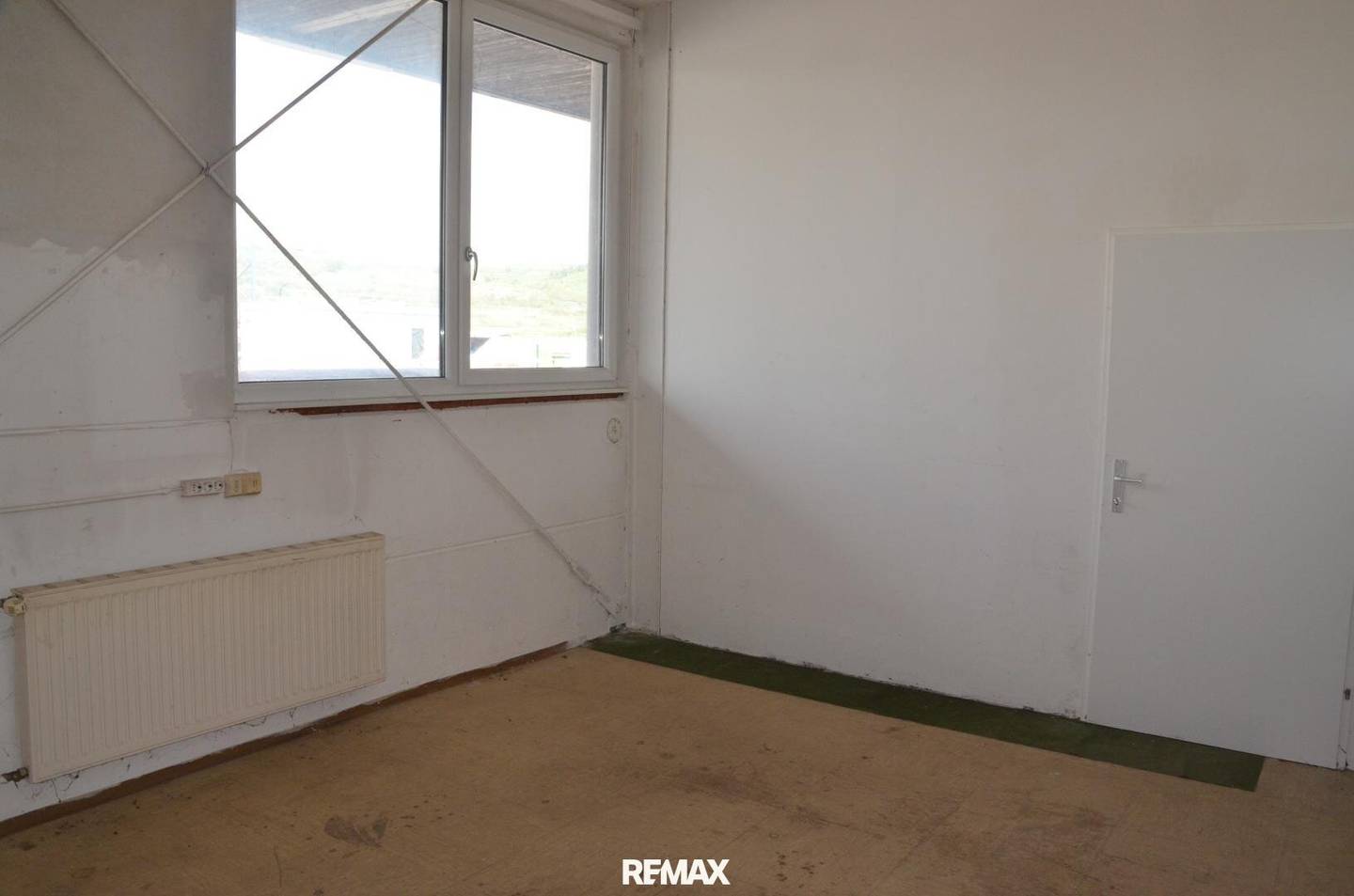 Compact Hall Office with Video Surveillance and EV Charging