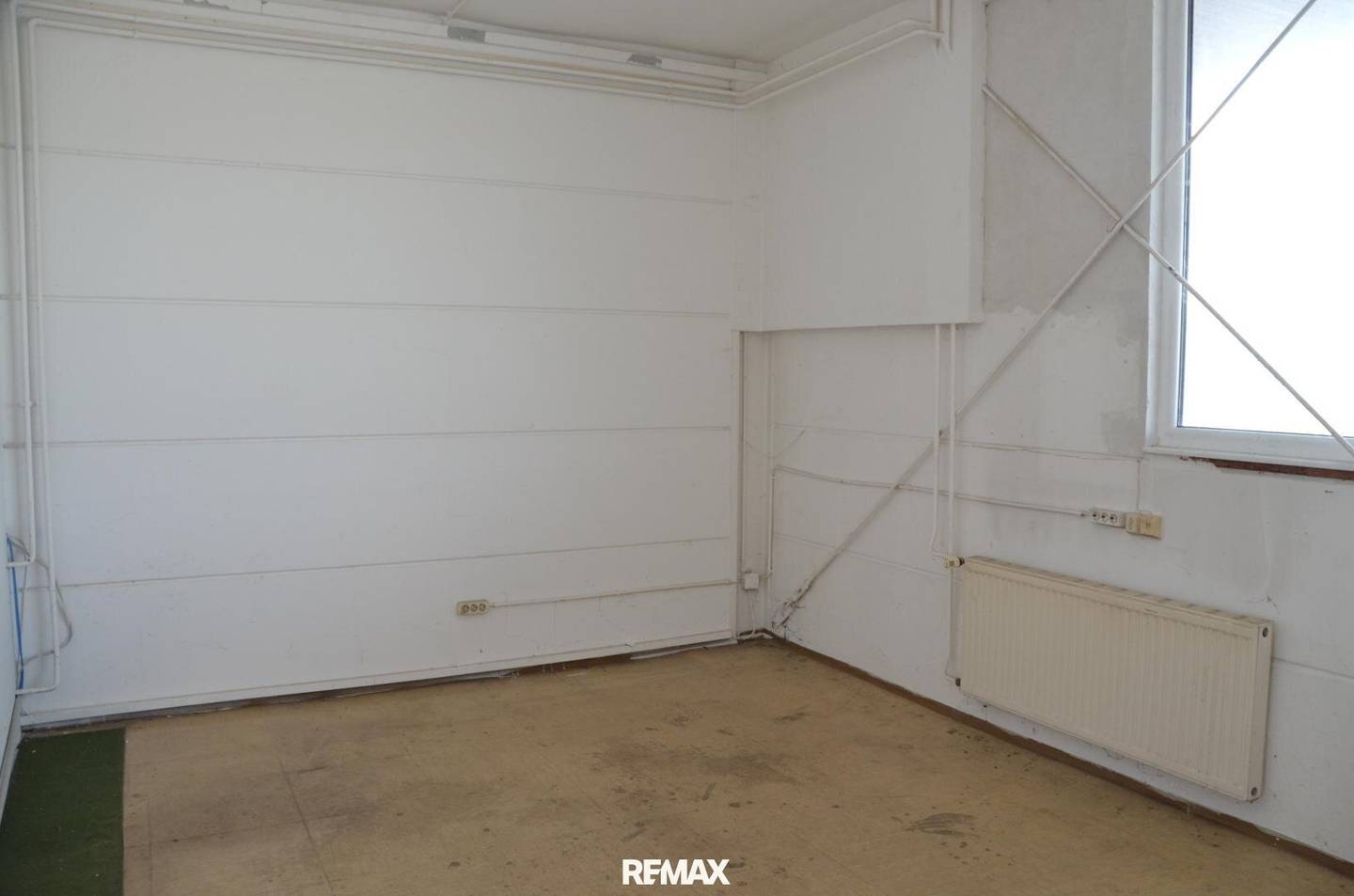 Compact Hall Office with Video Surveillance and EV Charging