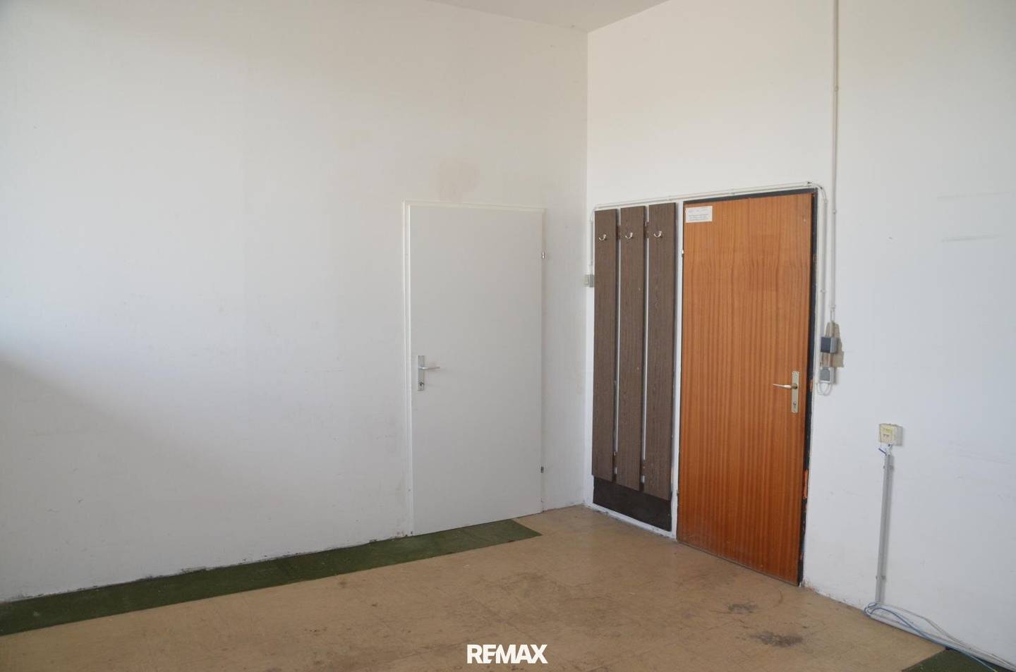 Compact Hall Office with Video Surveillance and EV Charging