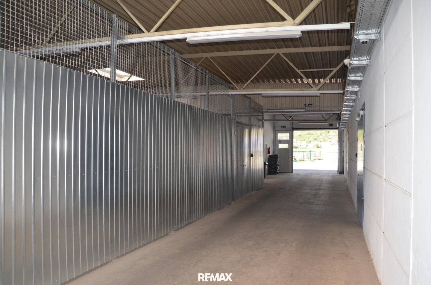 Compact Hall Office with Video Surveillance and EV Charging