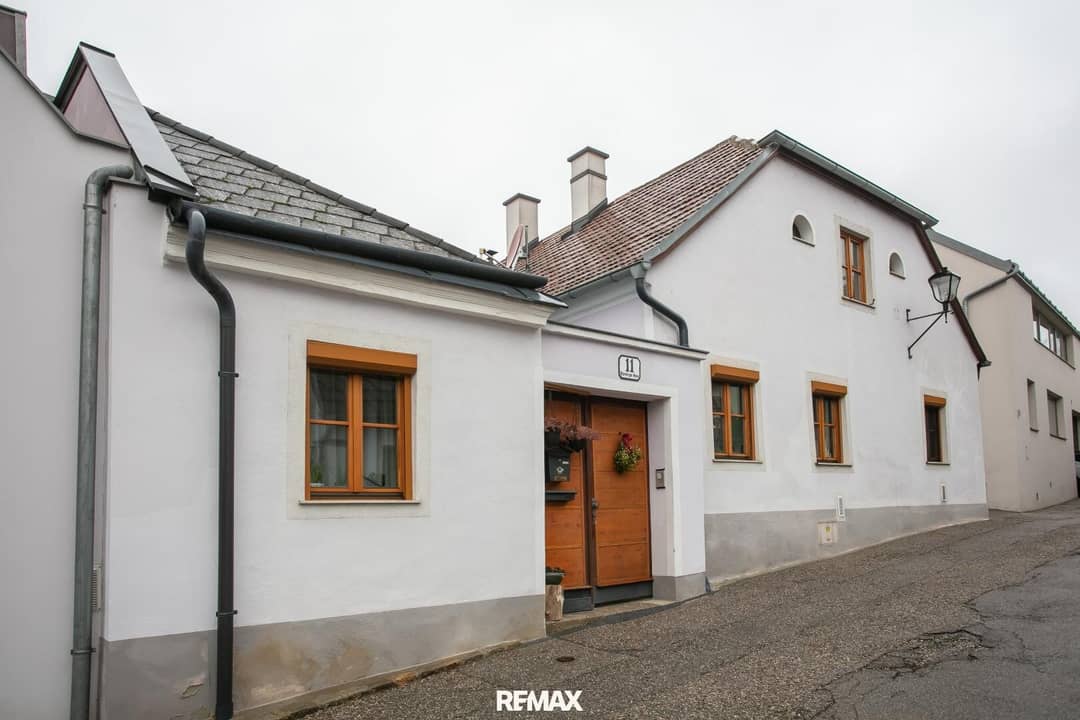 Charming Townhouse with Historic Cellar in Prime Old Town Location