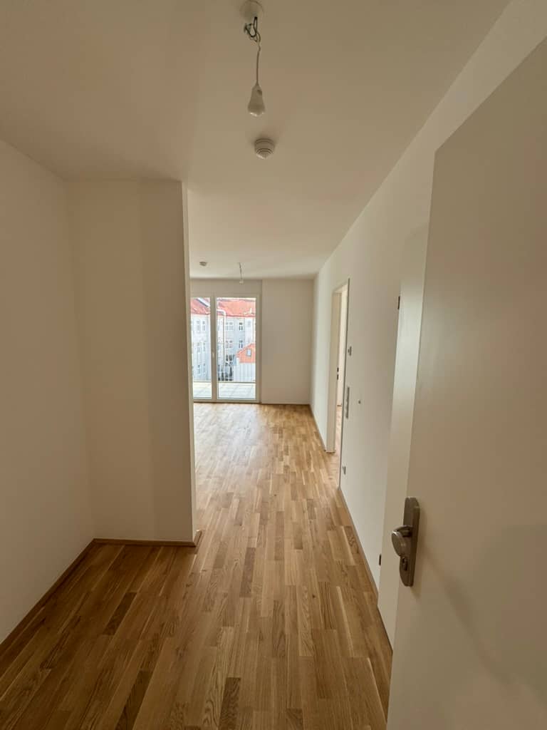 Helle Neubauwohnung mit Balkon und Grünblick