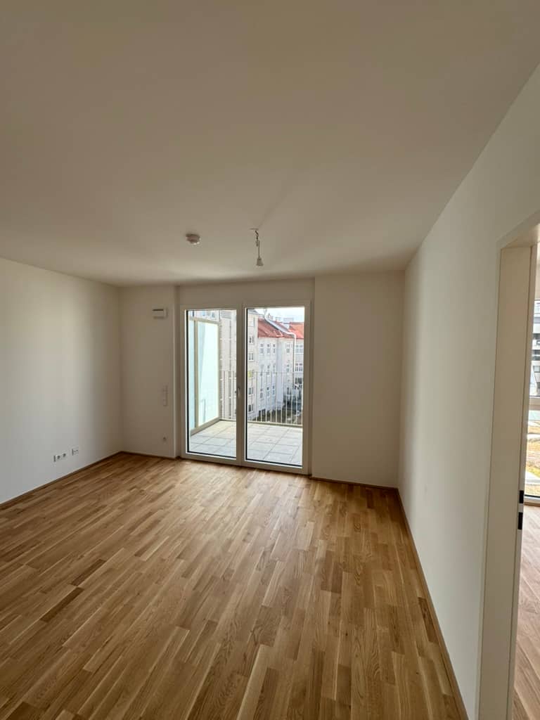 Helle Neubauwohnung mit Balkon und Grünblick
