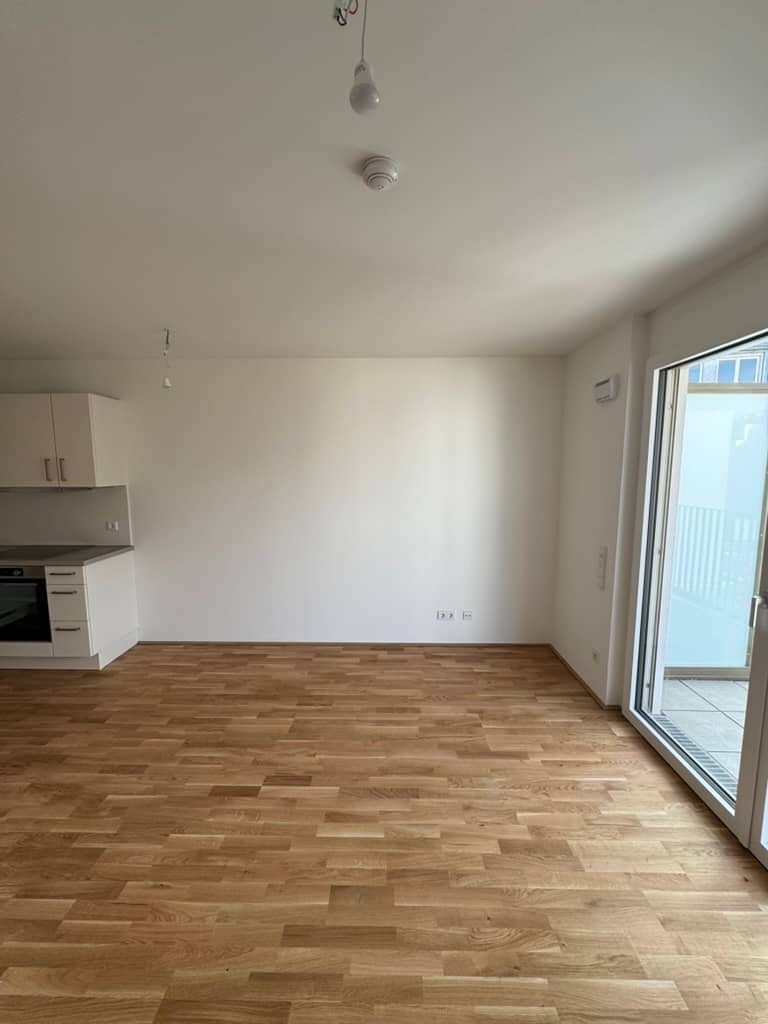 Helle Neubauwohnung mit Balkon und Grünblick