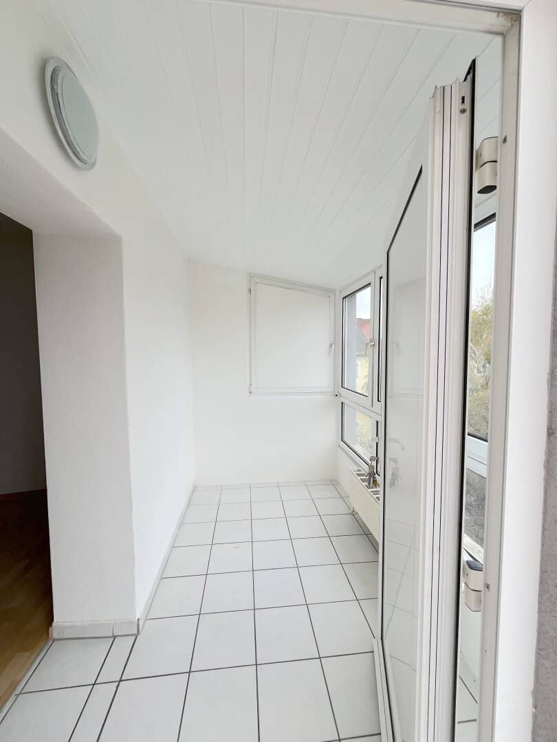Sonnige 3-Zimmer mit Wintergarten und Balkon