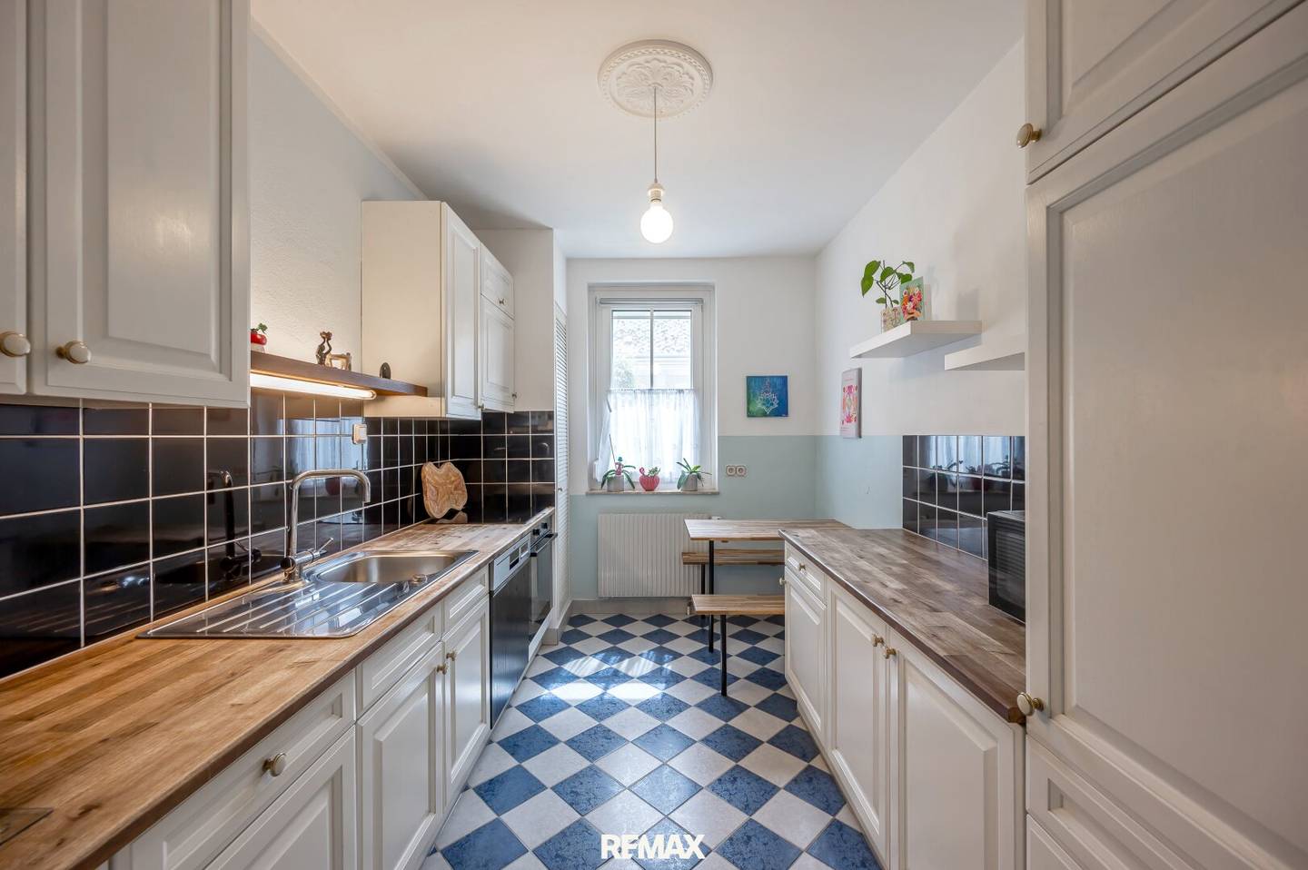 Wohnung mit drei Zimmern und Gemeinschaftsgarten