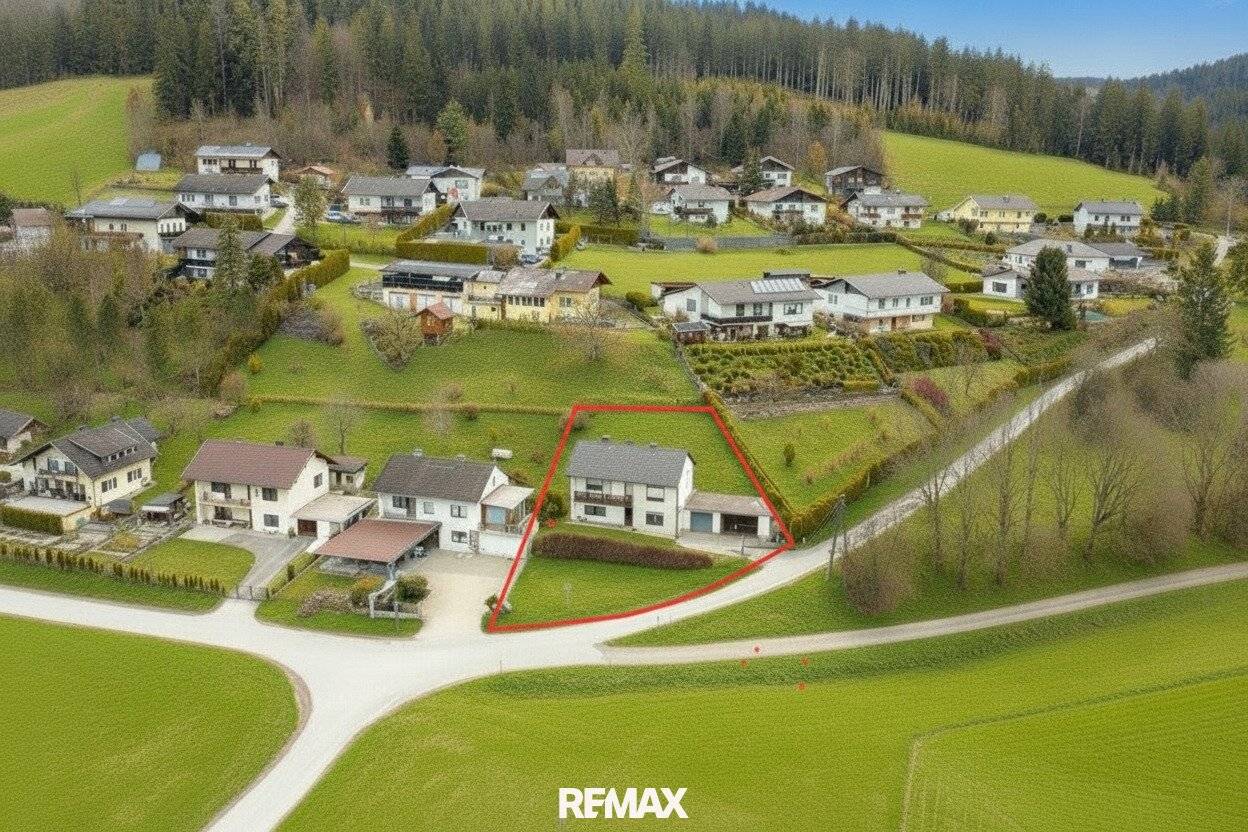 Solides Einfamilienhaus mit Balkon in ruhiger Grünlage