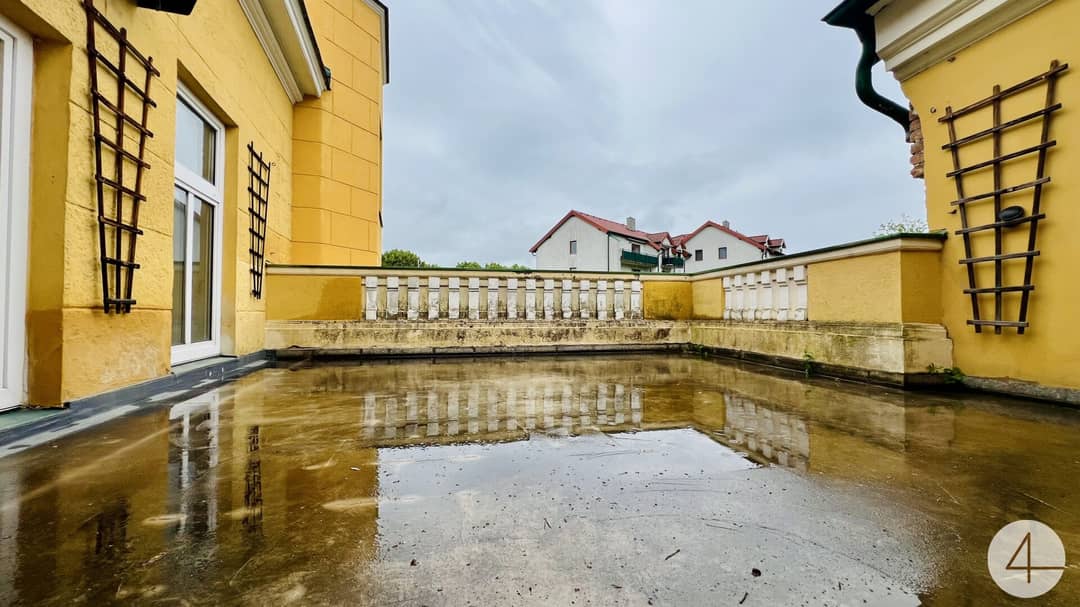 Old building apartment with terrace and green view