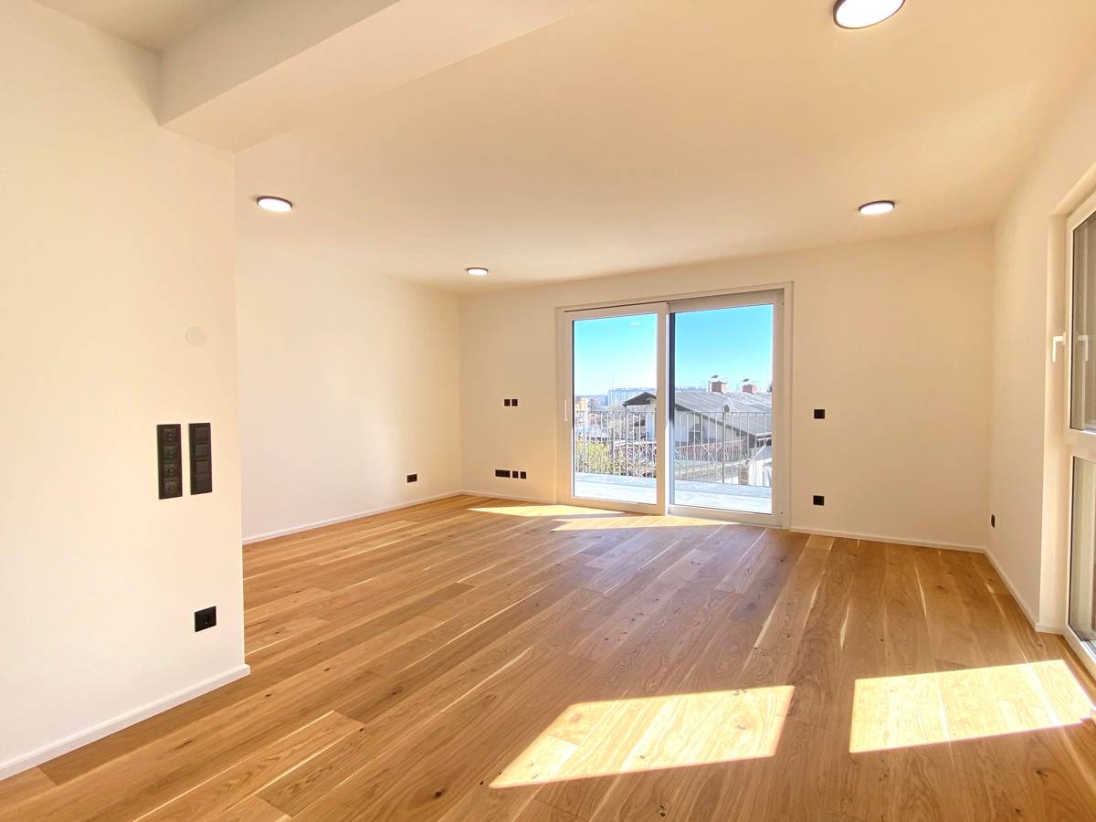 Brand new apartment with terrace in sunny quiet location