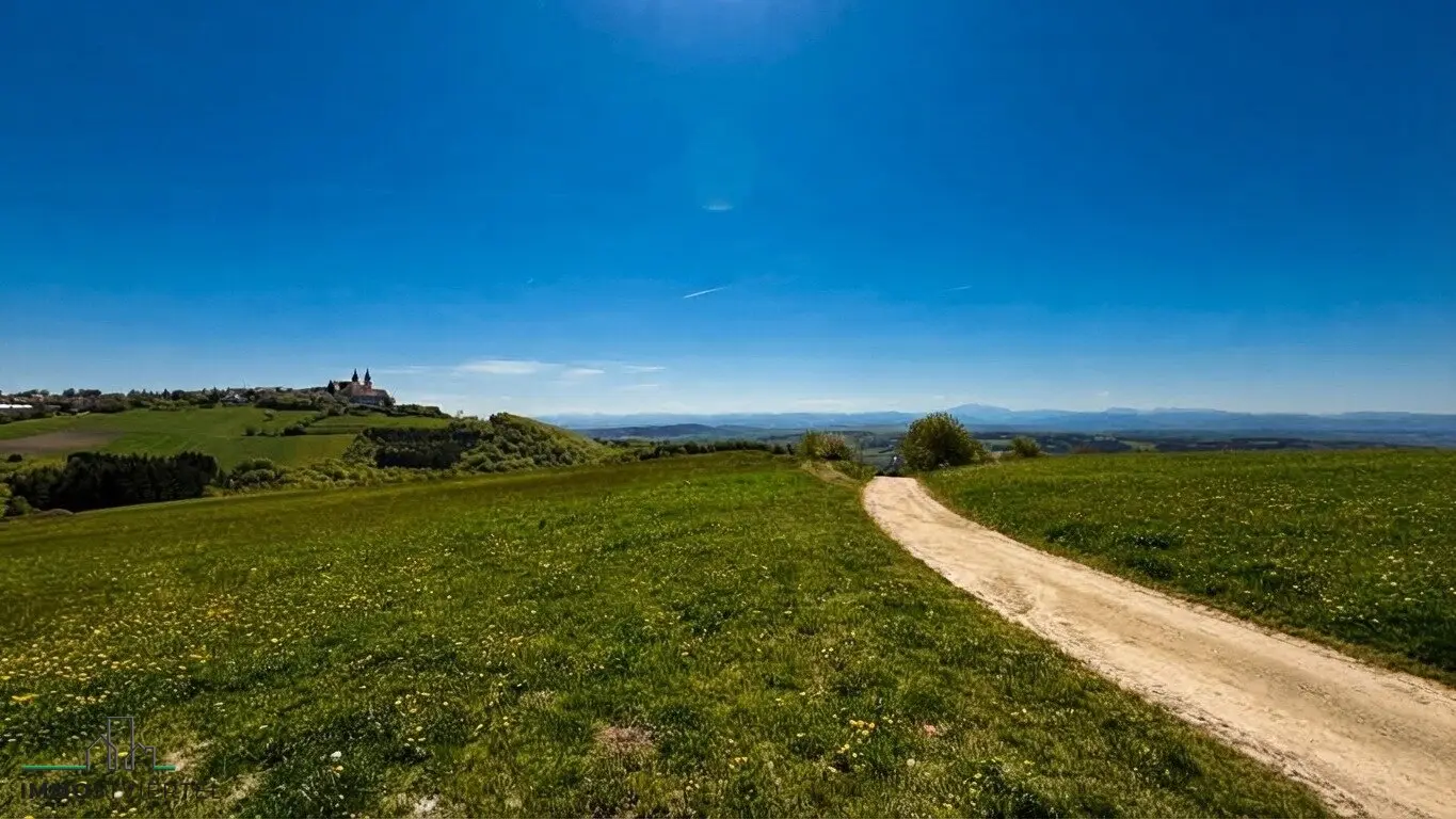 Plot with views of the Basilica and Alpine foothills