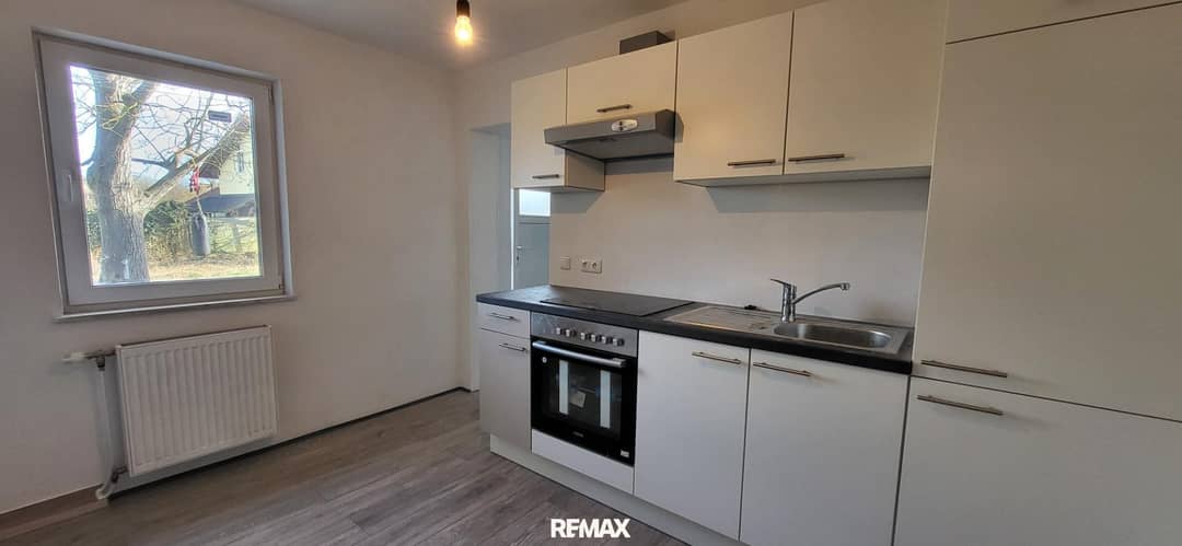 Ground floor apartment with garden and built in kitchen