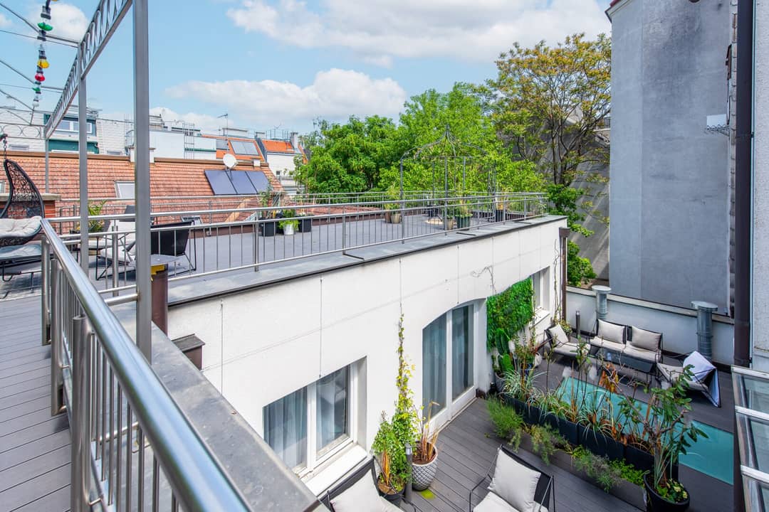 Charming Single Family Home with Rooftop Garden and Development Potential