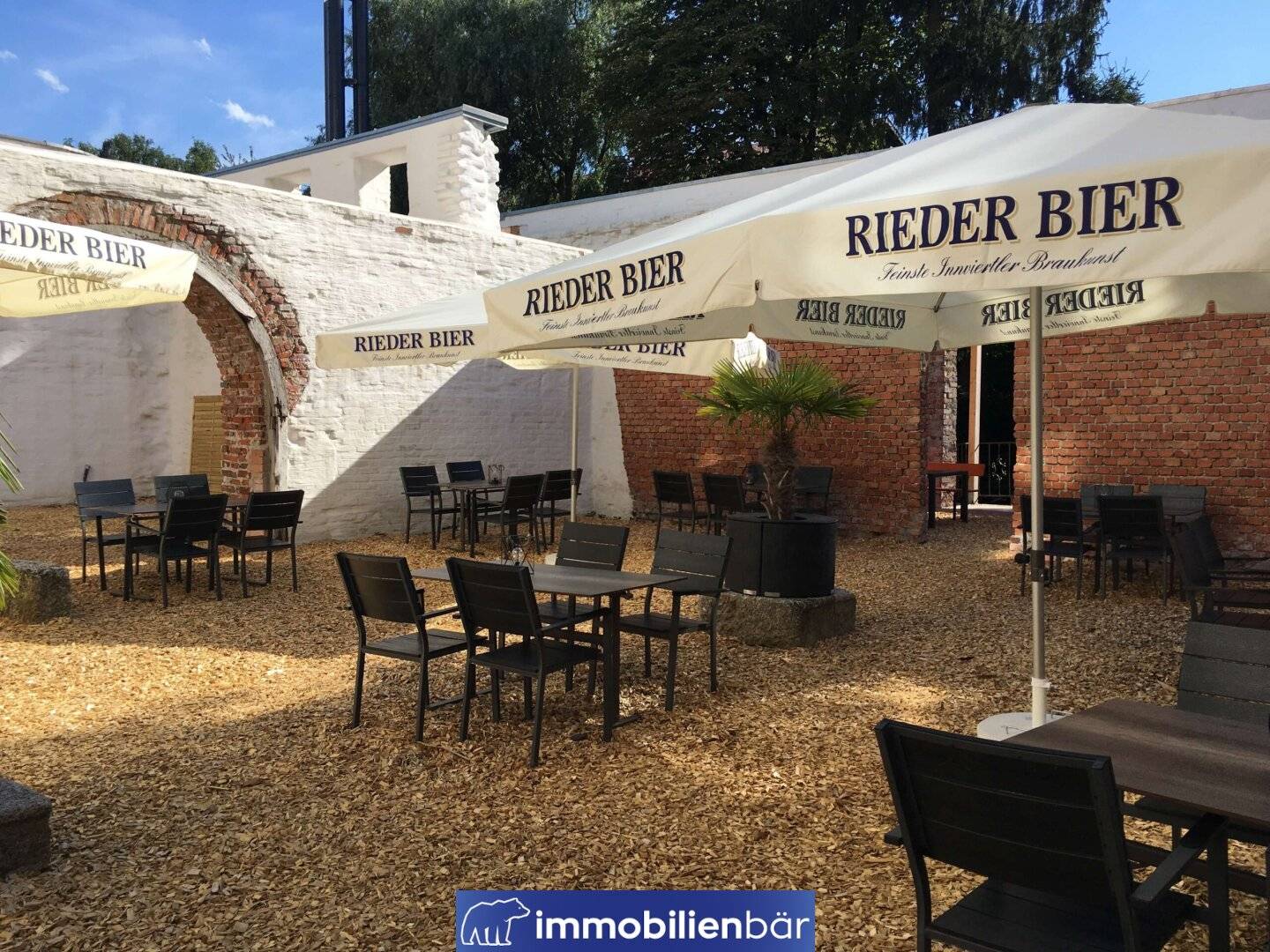 Gastronomy space in renovated castle with guest garden and bar