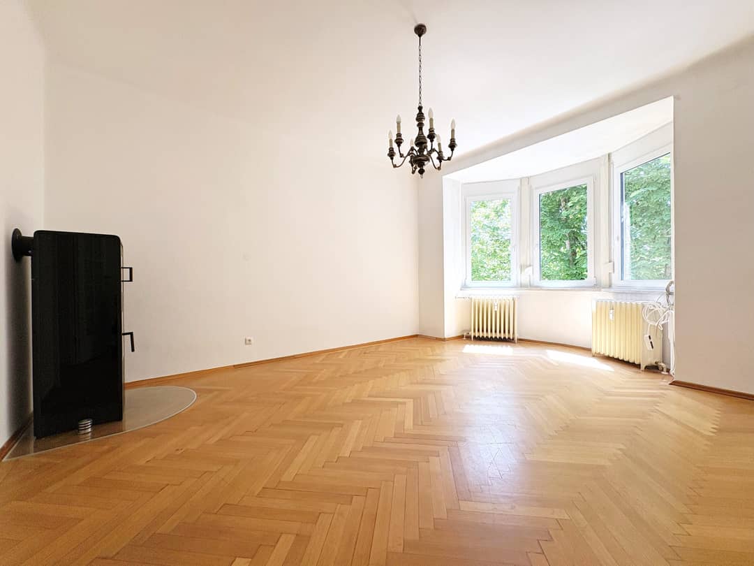 Altbauwohnung with fireplace bay window balcony