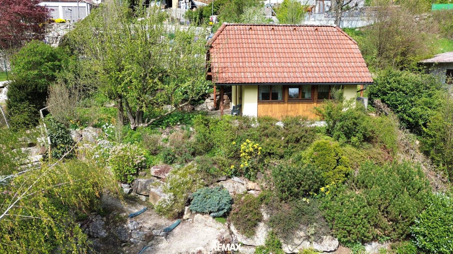 Garden house with terrace and green views