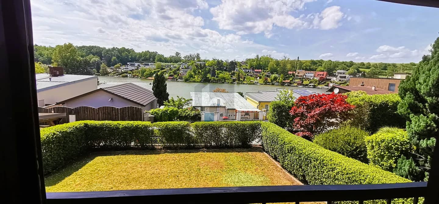 Ferienwohnung mit Wintergarten und freiem Seeblick