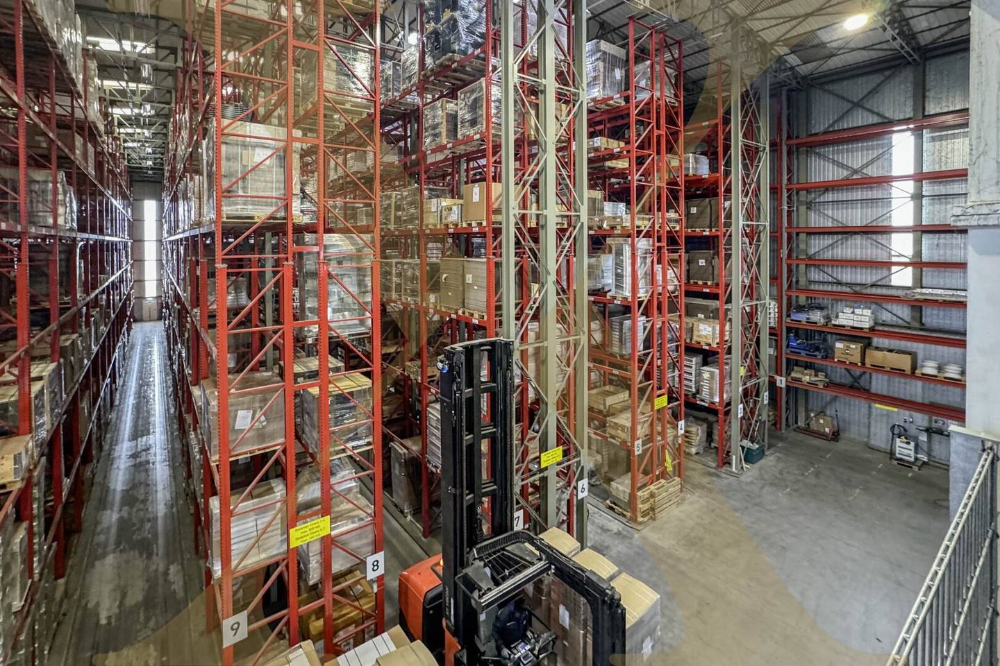 Warehouse space with open areas and truck parking